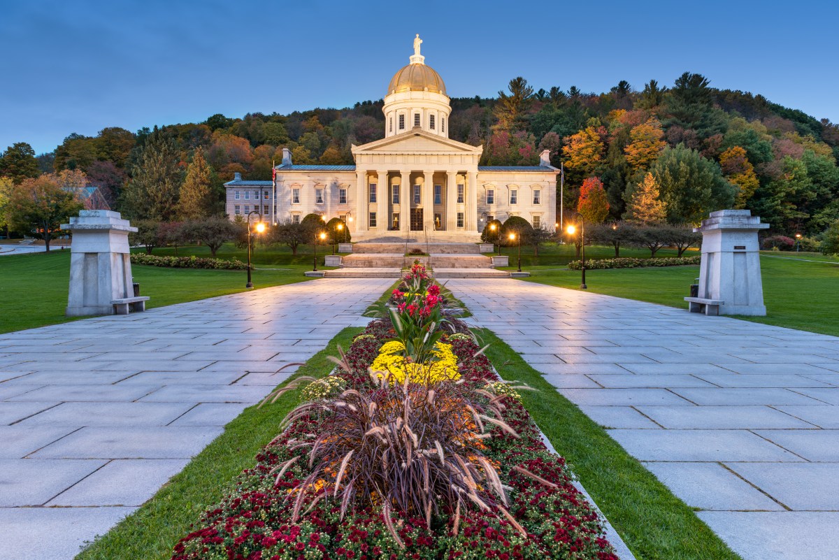 A building with a golden dome in the evening.